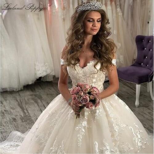 Elegant Lace Appliques Wedding Dresses 2020 Off the Shoulder Sleeveless Vestido de novia Floor Length Bridal Gowns Chapel Train