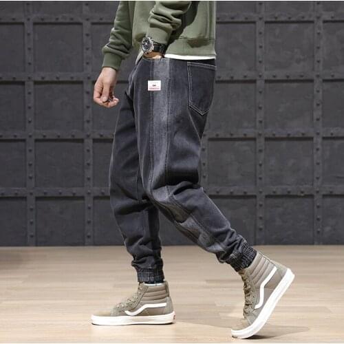 2021 New Fashion Streetwear Black Stripe Spliced Designer Denim Cargo Pants Japanese Vintage Hip Hop Jeans Men Harem Trousers