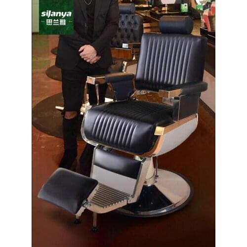 The large chair can be tilted down and lifted to shave and shave. BarBershop scissors and barber salon special mens hairdressin