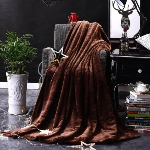 WHQ Fleece Blankets On The Sofa