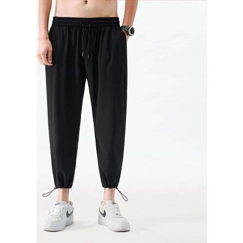 2021 Korean MenS Loose Ice Silk Casual Boys And Teenagers Trend Drawstring Leggings Basketball Pants Summer Thin 9-Point Trous