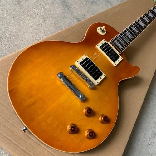 High-quality electric guitar, solid maple wood cover, one piece body & neck , tone-pro bridge, Good quality guitar.free shipping