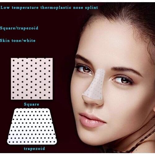 Correction of crooked nose with nasal splint after comprehensive rhinoplasty surgery