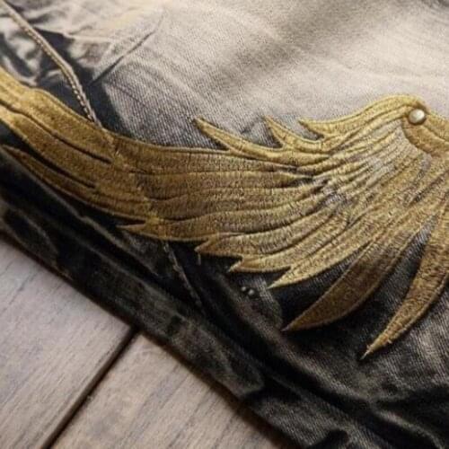 Hot Sale Summer Mens Retro Jeans Ripped Hole Male Slim Fit Denim Trousers Embroidery Wings Design Biker Jeans Pants Plus Size 42