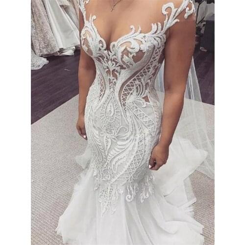 Plus Size Mermaid Wedding Dresses Bridal Gowns Sleeveless Sheer Jewel Neck Lace Appliqued Button Back Arabic Custom Made Robe