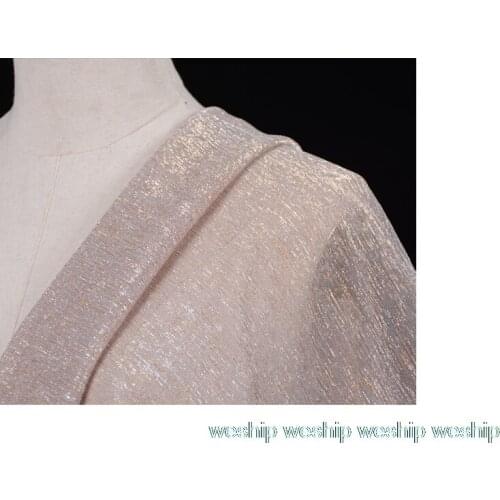 Bling-bling Bronzed golden Elastic fabric soft Gorgeous golden cloth for dress Background cloth