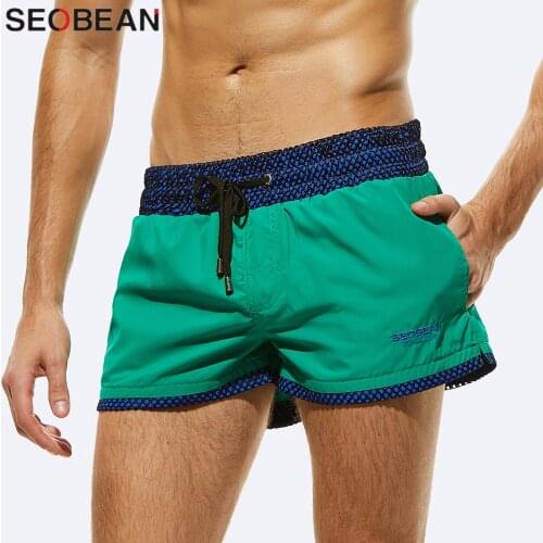 Quick Dry Mens Board Shorts Fashion Sea Maillot De Bain Beach Shorts Bermuda Sexy Solid Nylon Shorts Male Short