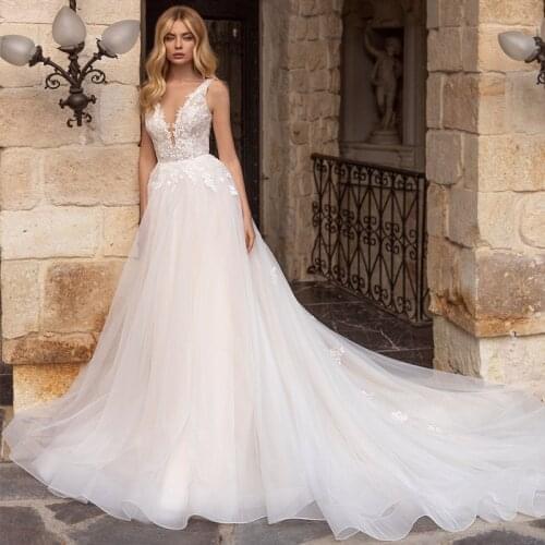 Eightree Boho Wedding Dresses 2021 Sleeveless V Neck Lace Applique Tulle Backless Bridal Princess Gown Dress Mariage Custom Size