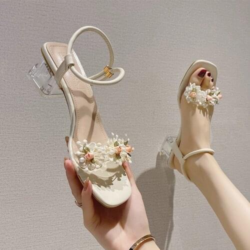 The new summer fashion line is full of transparent thick heels with skirts for womens shoes