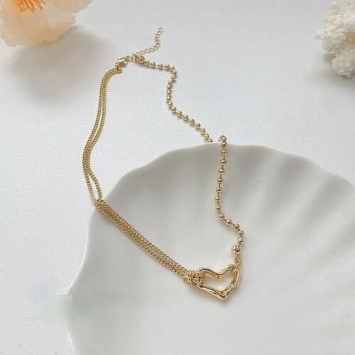 VSnow Temperament Irregular Asymmetric Love Heart Tie Pendant Necklace for Women Gold Chain Beaded Metal Hollow Necklace Jewelry