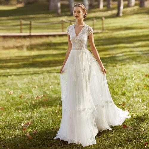 Boho Wedding Dresses Lace Cap Sleeves V Neck Sexy Illusion Back Pearls Light Tulle A Line Bohemian Bridal Gowns 2021