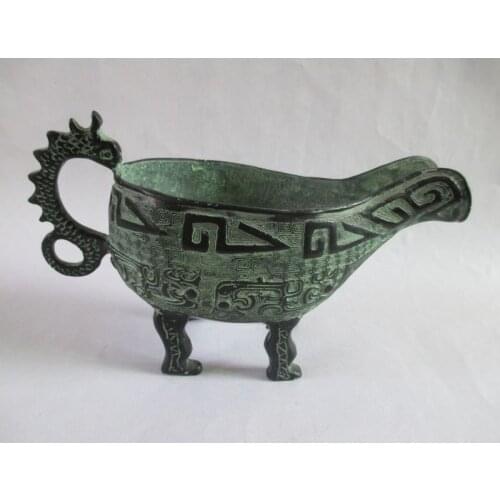 The ancient Chinese antique bronze inscriptions dragon wine glass sculpture