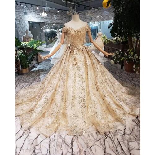 BGW HT4299 Tassel Wedding Dress Beads And Crystal Off Shoulder Champagne Bridal Dress Golden Lace Wedding Gown Abito Da Sposa