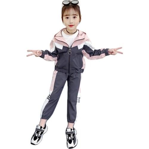 Kids girls leisure suit spring / autumn spell color jacket + pant 2pcs sets of new big virgin suit