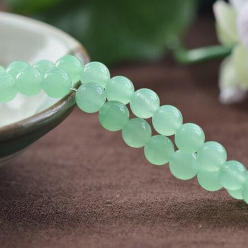 Joanlyn Grade A Natural Mint Green Jade Beads 6mm 8mm 10mm 12mm Smooth Polished Round 15 Inch Strand JA38