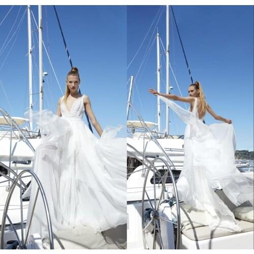 2020 Sexy Backless Wedding Dresses Lace Applique Tulle Tiered V Neck Sleeveless Vestido De Noiva Custom Made Bridal Dress