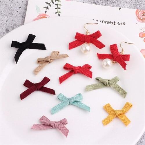 Wholesale 100PCs 23*26MM Handmade Ribbon Fabric Knot Bows Fit Girls Hair Jewelry Bow Center Gift Box Garment Ornament Decoration