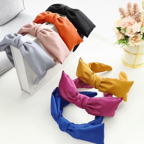 Korean version of simple bowknot retro wide-brim solid color fabric hair band temperament pressure hair headband women
