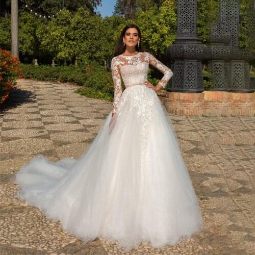 Long Sleeves Ball Gowns Wedding Dresses 2021 Crystals Belt Lace Appliques Tulle Princess Bridal Gowns Custom Made