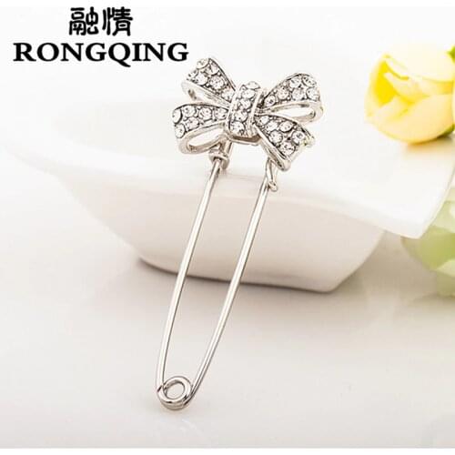 RONGQING Fashion Simple Delicate Crystal Bowknot Brooches For Wedding Pin Anti Clothes Corsage Hijab Pins For Women