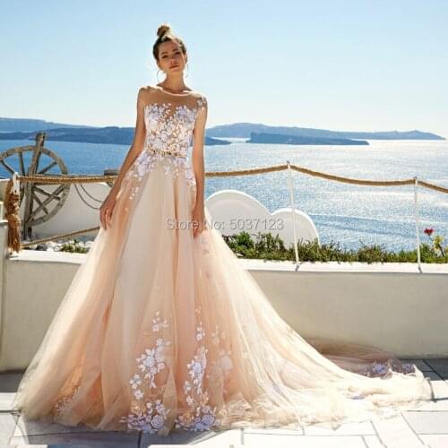New 2021 Champagne A Line Wedding Dresses O Neck Sleeveless Lace Appliques Backless Robe De Mariee Court Train Vestido De Noiva
