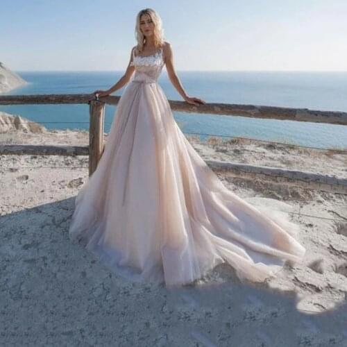 Spaghetti Straps Wedding Dresses See Through Empire Waist Champagne Lace Applique Lace Up Beach Bridal Gowns Court Train 2021