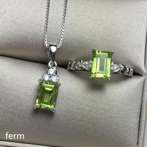 KJJEAXCMY exquisite jewelry 925 pure silver inlaid natural mood stone olivine ladies jewelry set rings pendant 2 pieces