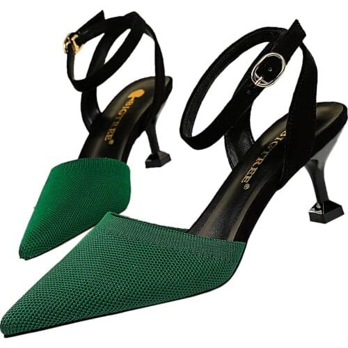 Fashionable womens shoes, knitwear. Sandals, sandals. Thin Heels with high heels, leather colors, sharp cutouts in sandals
