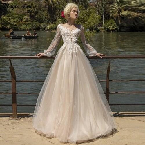 Magic Awn Full Sleeves Champagne Wedding Dresses Beacg Lace Appliques Illusion Boho A-Line Princess Bridal Gowns Abito Da Sposa
