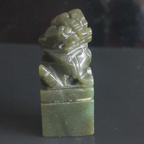 Carved Chinese lion animal figurine statue