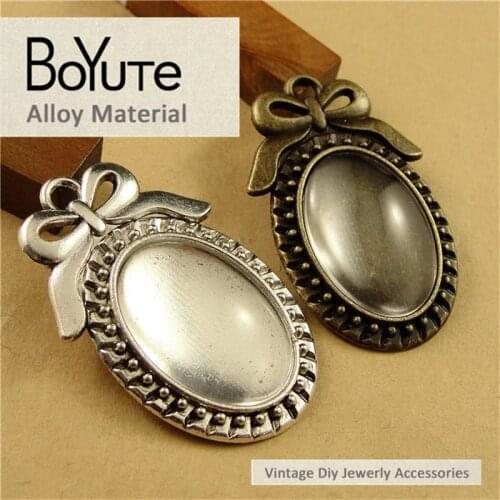 BoYuTe (40 Pieces/Lot) 25*18MM Antique Bronze Silver Plated Filigree Bowknot Cameo Cabochon Base Setting Pendant Jewelry Blank