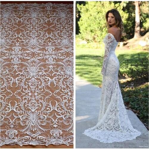 La Belleza New fashion Off white rayon with clear shining sequins on netting wedding/brides/evening dress lace fabric