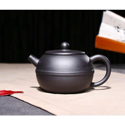 Yixing purple clay pot genuine pure manual raw ore black mud line round pot ball hole effluent Kungfu Teapot Tea Set