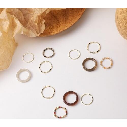 XiaoboACC 4Pcs Korea Cold Wind Soft Cute Sister Bohemia Acrylic Crysta Beaded Rings
