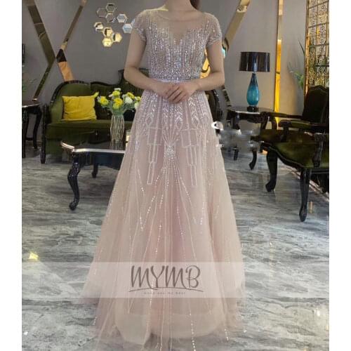 2021 Amazing Sparking Blush Prom Party Gowns Cap Sleeves Design Beaded Aline Evening Wear Dress Plus Size 18 vestidos de fiesta