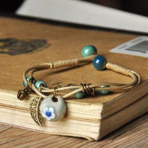 Ceramic Beads Bracelets Hollow Leaf Bells Pendant Statement Charm Flower Bangles Hand Woven Chains Womens Wristbands Jewelry