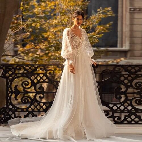 Romantic Champagne Wedding Dresses V-neck Lace Appliques 3D Flowers Lantern Sleeves Buttons Back Bridal Gown Robe de mariee