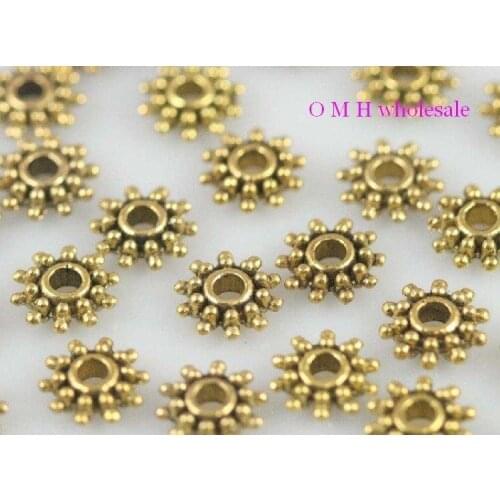 OMH wholesale Free ship 30pcs golden daisy spacer beads Jewelry metal beads 9X3mm ZL512