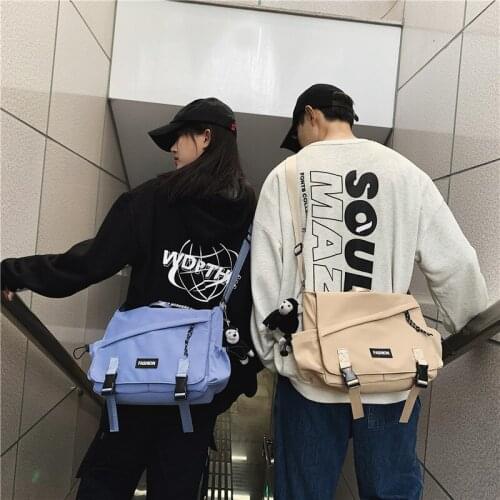The new 2021 Japanese young men and women leisure shoulder bag nylon fabric ins han edition inclined shoulder bag