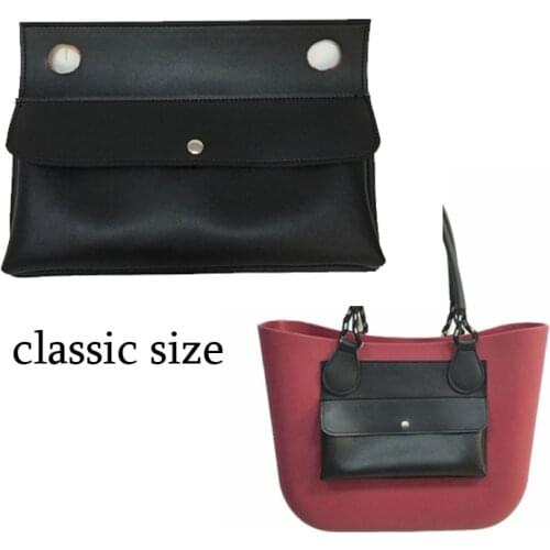 One extra outside or inside pocket for obag