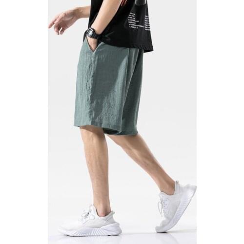 Summer wrinkled ice sports shorts mens large loose thin casual beach Capri trend versatile