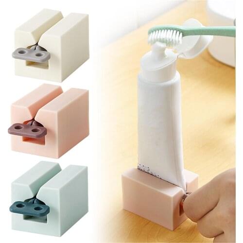 Dispenser Rolling Holder with Rotating Shaft Plastic Toothpaste Dispenser for Bathroom Toothpaste Squeezers