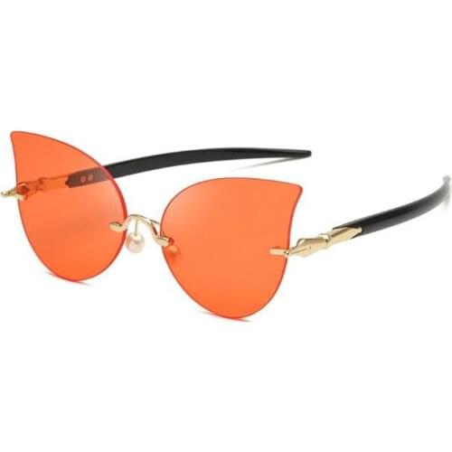 Retro frameless men sunglasses cat eye metal cross - border sunglasses female American hipster ocean sunglasses glasses