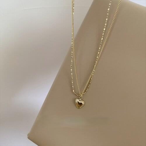 U-Magical Statement Double Layer Love Heart Round Beads Chain Pendant Necklace for Women Gold Thin Metallic Necklace Jewelry