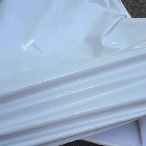 145cm*100cm White Shiny knit high stretch PU imitation leather High-end white mirror leather fabric for pants, jacket, clothing