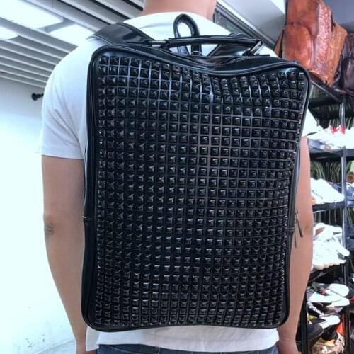 Backpack male personality rivet leather schoolbag computer bag fashion travel bag large capacity male fashion bag leisure bag