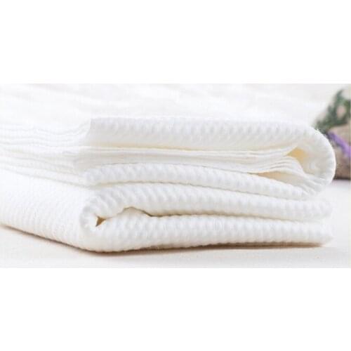 New fashion travel/Hotel white disposable 1 piece face towel 1 piece bath towel non-woven towel set wholesale