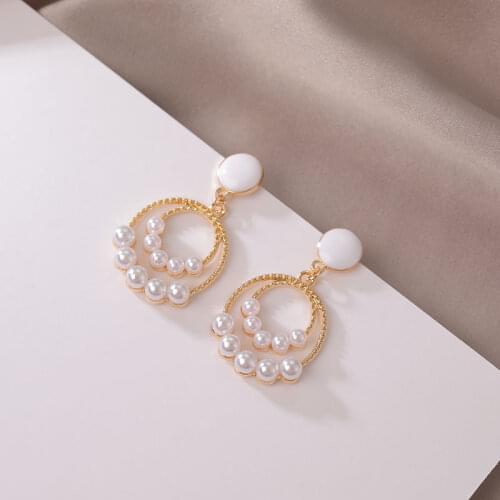 The new Korean version of artificial pearl sweet geometric round pendant earrings fashion all-match female earrings