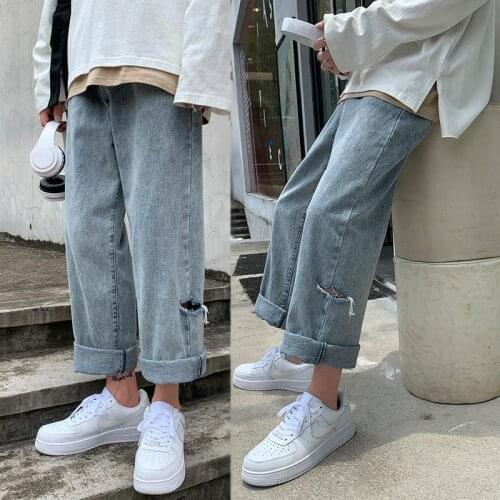 Ins spring and summer broken hole retro washed light color jeans women BF style loose and versatile straight pants trend