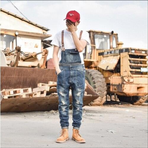 New Slim-fit Denim Overalls Bib Pants Mens Zipper Decorative Denim Suspenders Jumpsuit Hairstylist Tide Jeans Stage Costumes